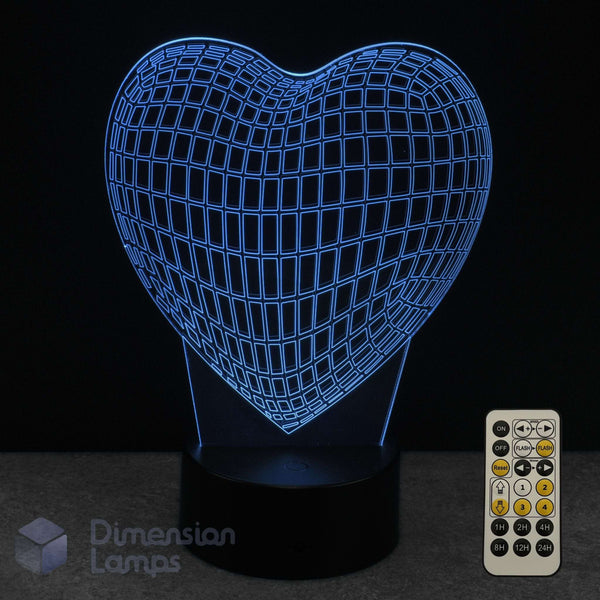 Wireframe heart-shaped 3D LED lamp with grid pattern and remote control on a dark background. Girls night light. 