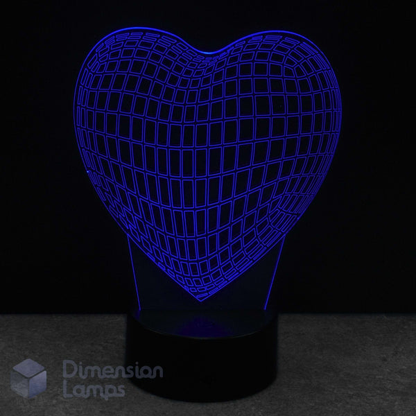 Wireframe heart-shaped 3D LED lamp with grid pattern glowing blue on a dark background. Girls gift idea. 