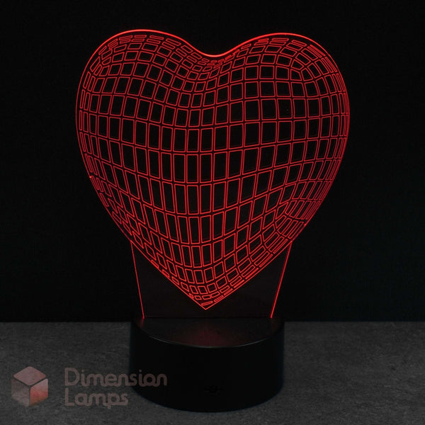 Wireframe heart-shaped lamp with grid pattern on a dark background, featuring the brand 'Dimension Lamps'.