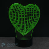 Wireframe heart-shaped lamp with grid pattern on a black background, branded 'Dimension Lamps'. Girls night light gift idea. 