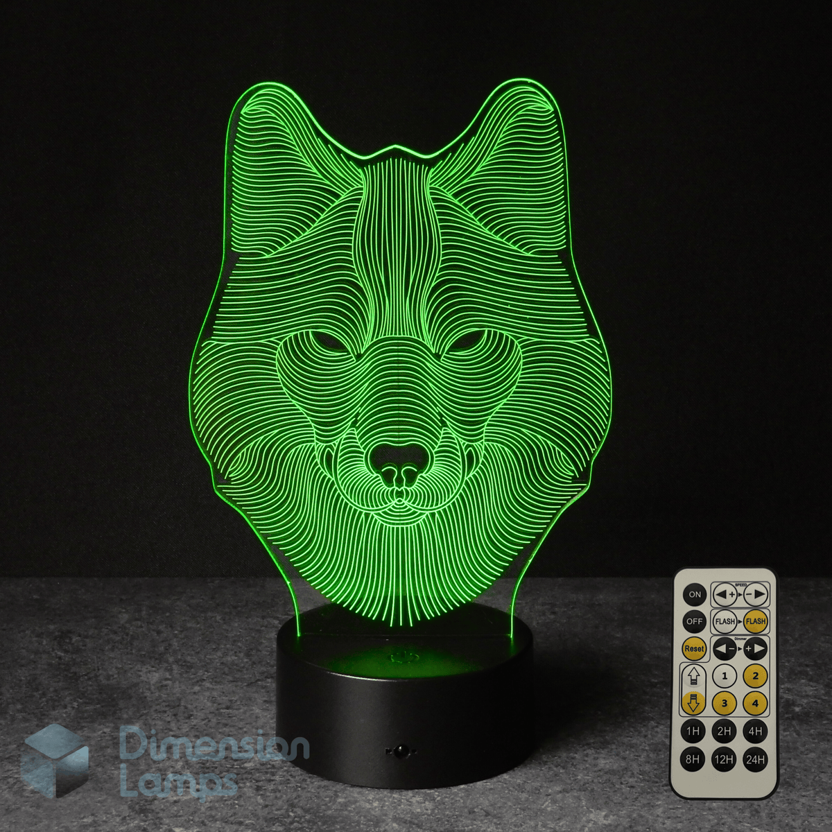 3D wolf lamp with green light and remote control on a dark background