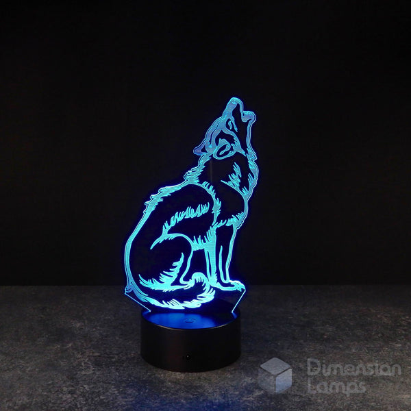 Blue howling wolf 3D lamp: faceted design of a wolf in a howling posture on a black base against a dark background. Unique lighting for a man cave in Australia. 