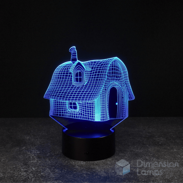 Nightlight: A 3D wireframe fairytale house lamp, glowing blue, featuring a chimney, curved roof, and arched door. It rests on a black base against a dark background. A magical house and unique fantasy gift. 