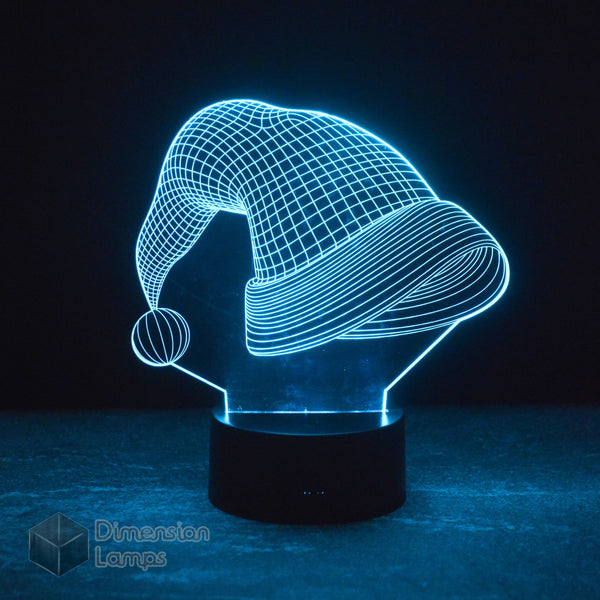 This Santa Hat 3D lamp, a unique Christmas lighting option in Australia, emits a bright cyan glow, showcasing the iconic Santa hat design. 