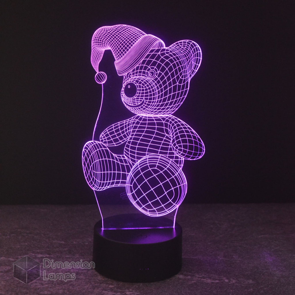 Purple 3D lamp in the shape of a teddy bear wearing a Santa hat. This night light is suitable for children's Christmas decor and emits a soft light glow.