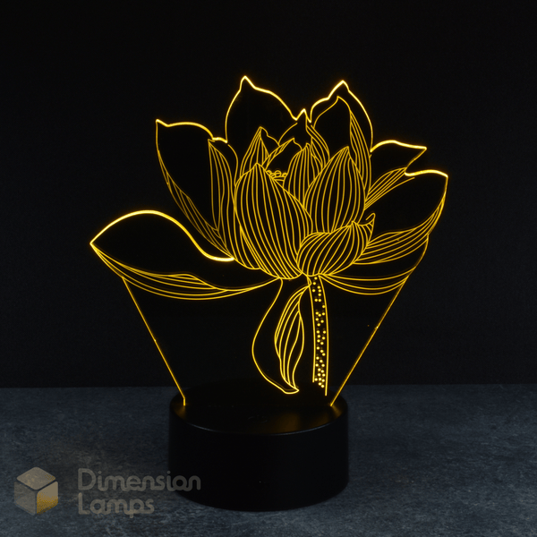 The elegant form of a lotus flower is captured in this 3D lamp, glowing in green. It rests on a round black base, set against a dark backdrop. This unique nightlight offers a peaceful and decorative touch. 