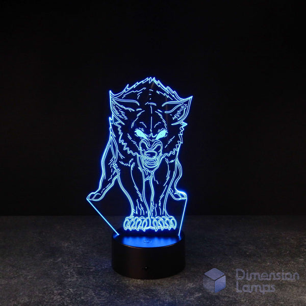 Detailed wolf 3D lamp: blue wireframe design of a wolf with glowing eyes and visible teeth, standing on a patterned base against a dark background. A cool gift for teens' room decor in Australia. 