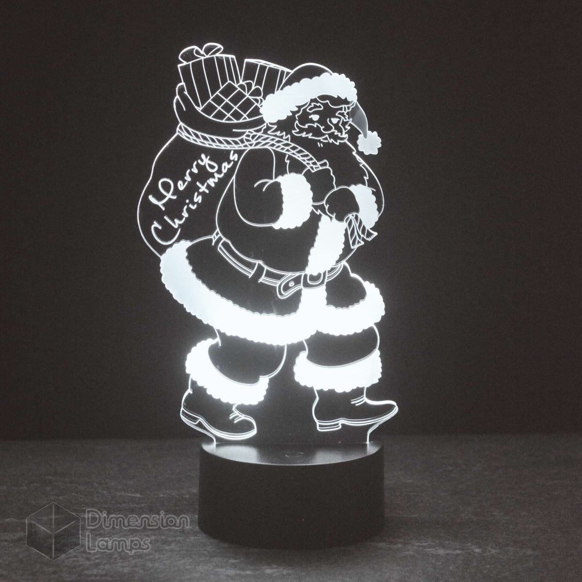 Santa Claus 3D lamp: unique Christmas lighting. Features a detailed Santa carrying a "Merry Christmas" sack, ideal for distinctive seasonal decor. 