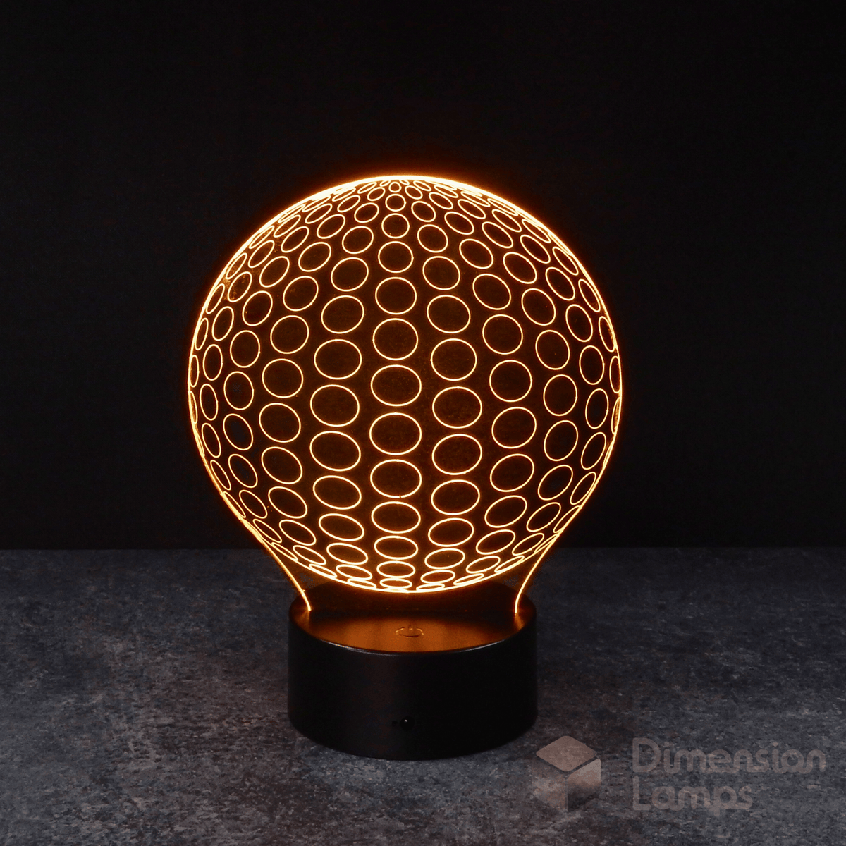 Nightlight: A 3D spherical lamp featuring a symmetrical design of radiating circles, glowing yellow on a black base against a dark background. Its balanced form can serve as a calming study aid. 