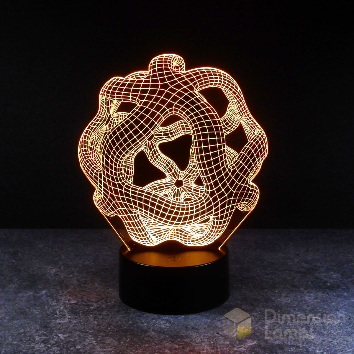 Nightlight: A 3D lamp with a complex, warped geometric pattern, glowing yellow and rising from a black base against a dark background. A cool night light for teens. 
