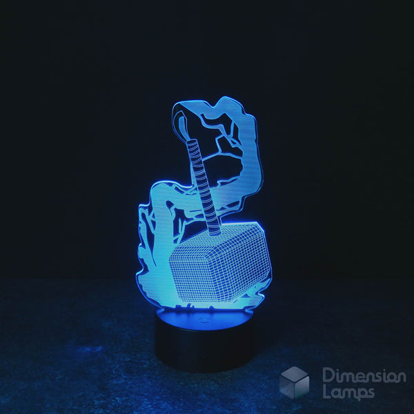 3D illusion lamp nightlight featuring a 3D Mythical Hammer design, illuminated in cyan with lightning effects. A unique and cool gift for teenagers. 