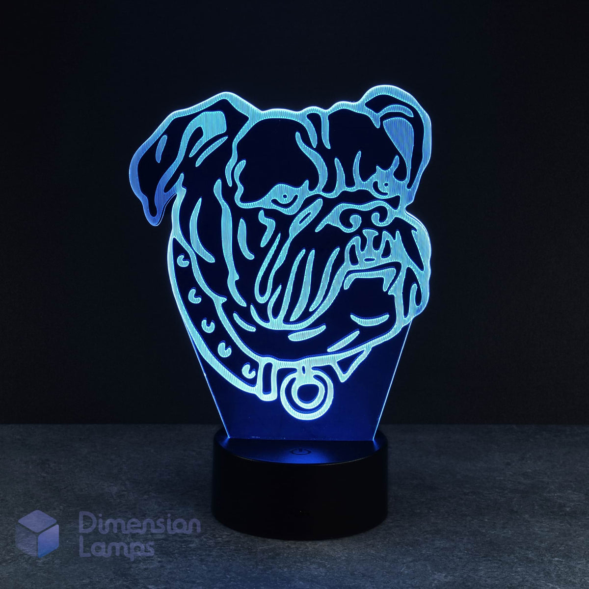 Blue bulldog 3d night lamps: blue illumination of a detailed laser-etched bulldog head with a collar on a lamp, rising from a black base against a dark background. A thoughtful gift idea for dog lovers and bulldog owners.