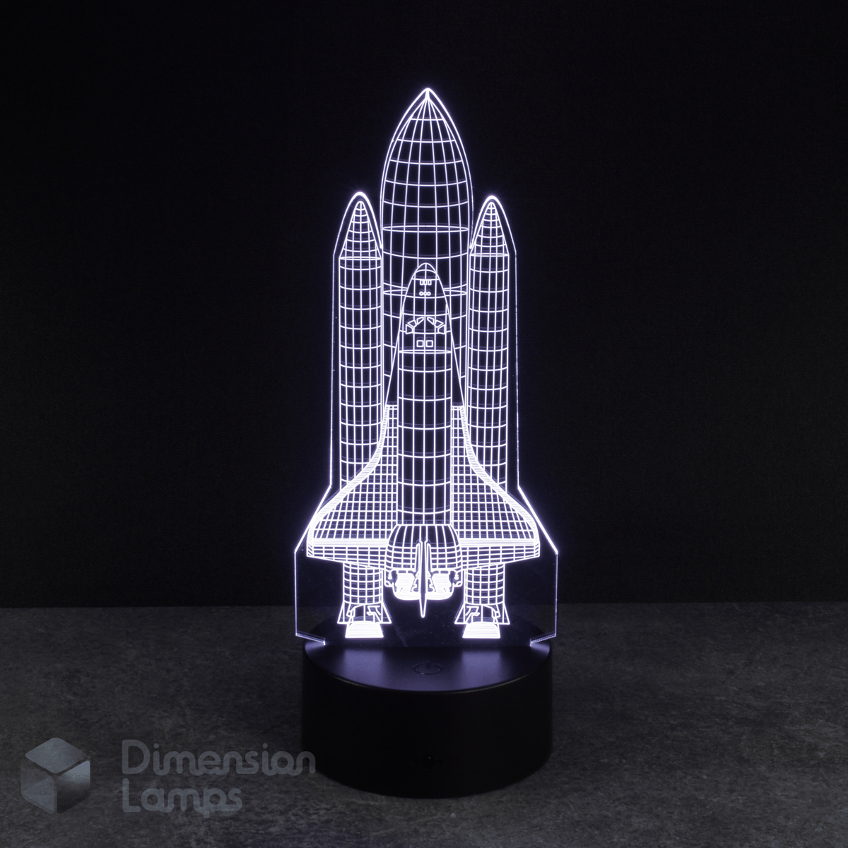 White Space Shuttle 3d night lamps: a detailed design of a rocket, illuminated by white LEDs on a base against a dark background. A captivating lighting option for a boys bedroom with a space theme.