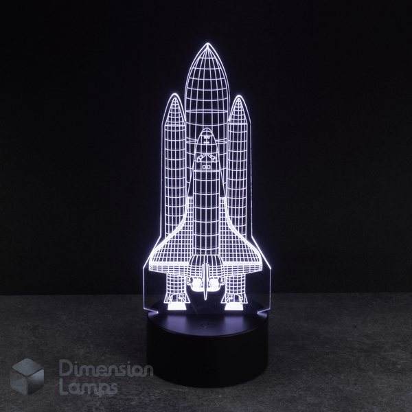 White Space Shuttle 3d night lamps: a detailed design of a rocket, illuminated by white LEDs on a base against a dark background. A captivating lighting option for a boys bedroom with a space theme.