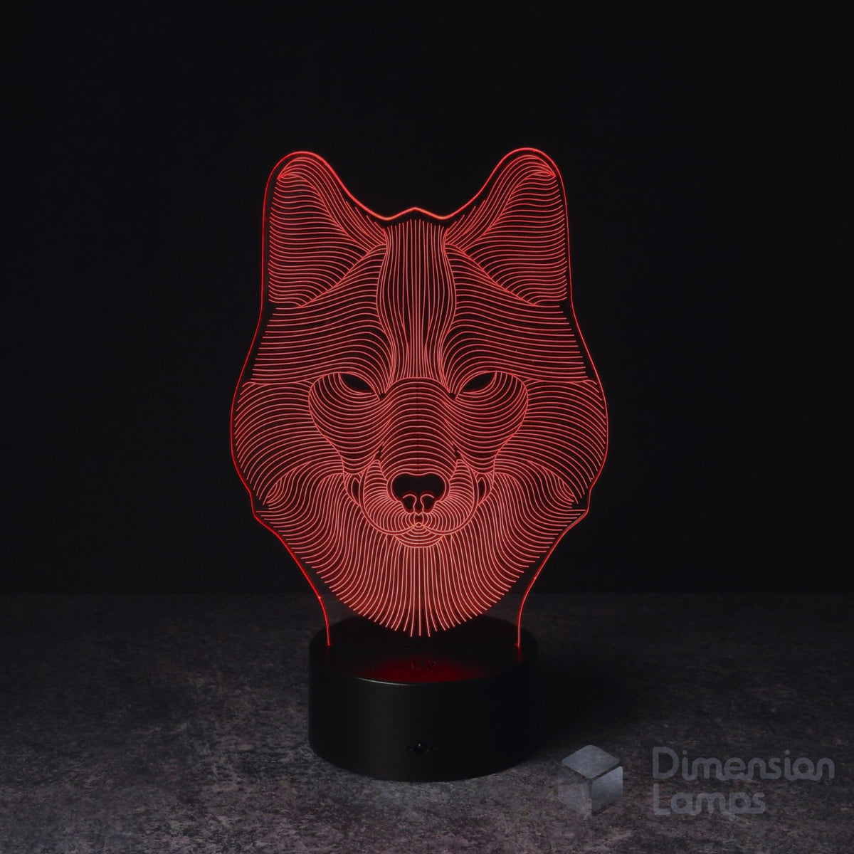 A 3D illusion lamp of a wolf's head, emitting a striking red light. 3d night lamp features a striking and detailed wolf head design. 